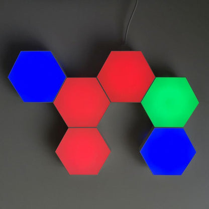 Then simply display on any surface or wall with the included sticky pads or with nails