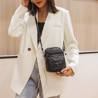 Sac bandoulière en cuir Lighteme