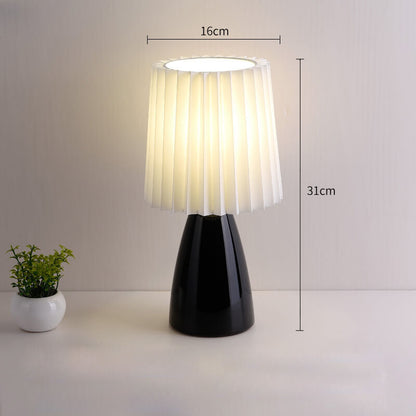 Lampe de table plissée en céramique Lighteme