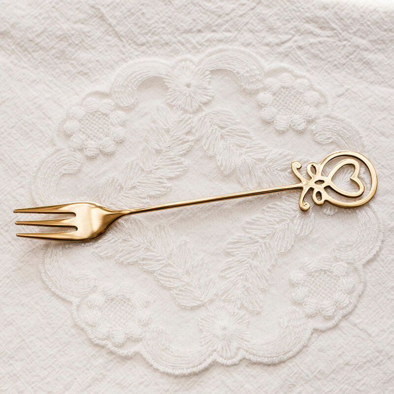 Cuillère et fourchette à dessert Lighteme en forme de poulpe
