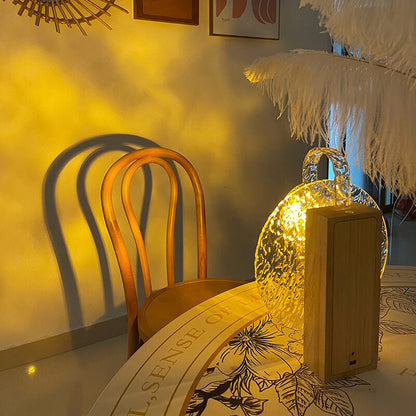 Lampe de nuit rotative Lighteme à ondulations d'eau