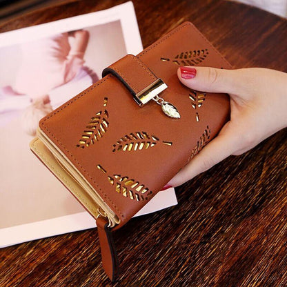 Lighteme – Elegante Clutch mit Blattverzierung